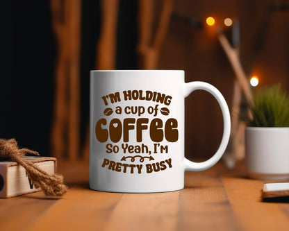 I'm Holding A Cup Of Coffee Office Work Humor Coffee Mug