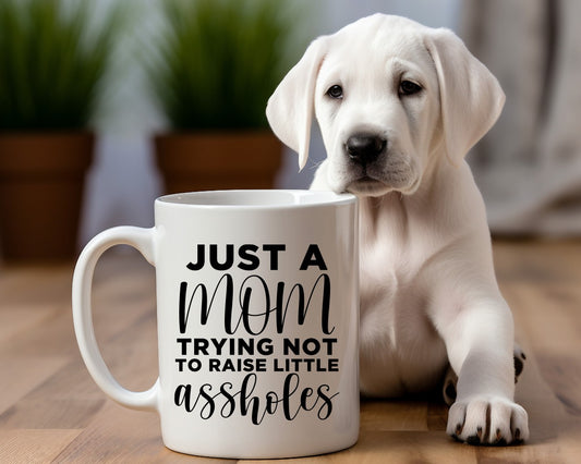Just A Mom Trying Not To Raise Little Assholes Mom Coffee Mug